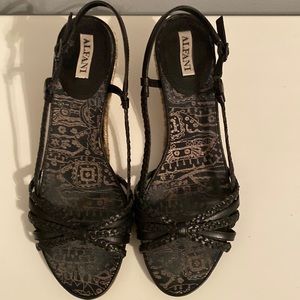 Alfani black sandal with jute wedge heel. Jute has a gold thread through it
